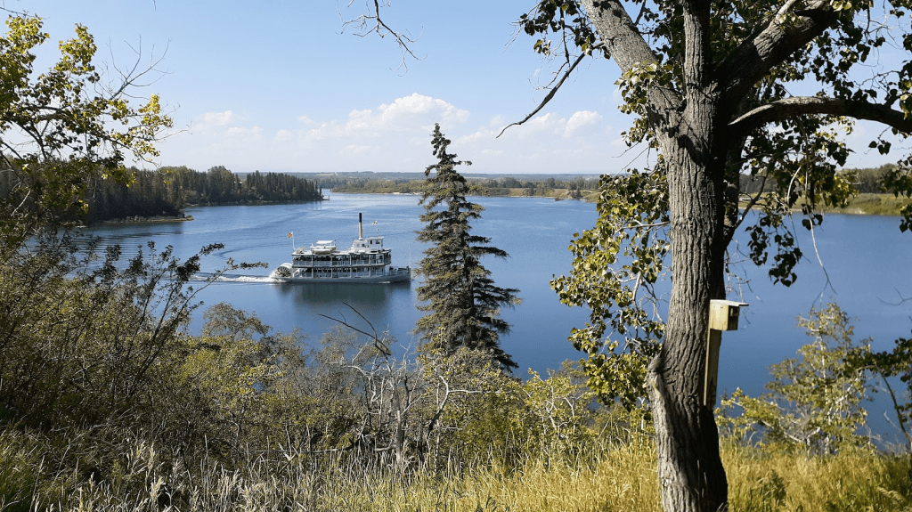 A steam boat on a lake